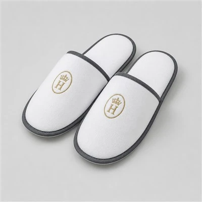 Personaliziran hotelski copat s tiskanim logotipom po meri